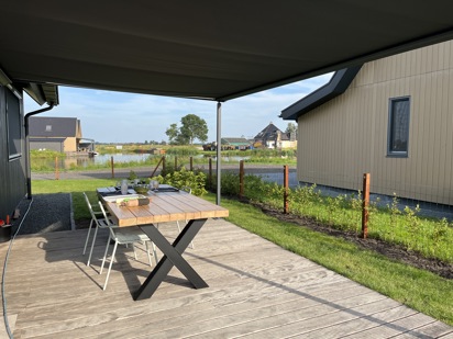 Onder de zonneluifel